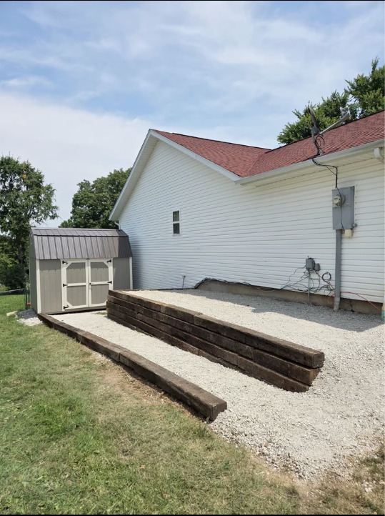 a retaining wall for water drainage and erosion control